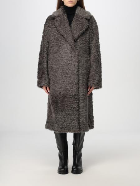 Fur coats woman Stand Studio