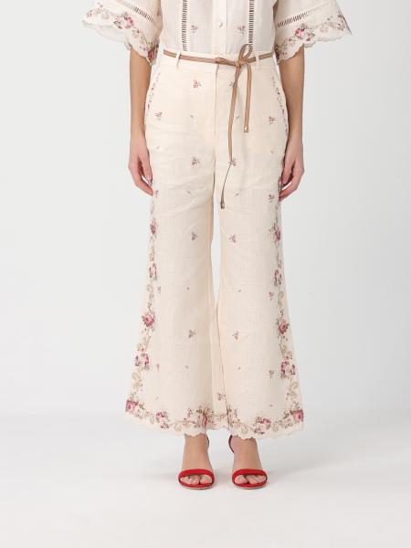 Pantalones flared de lino con estampado floral Zimmermann