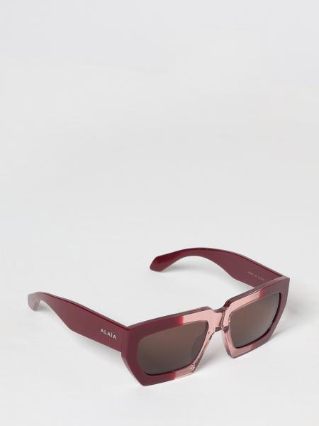 Lunettes de soleil œil-de-chat Alaïa à monture rectangulaire bicolore