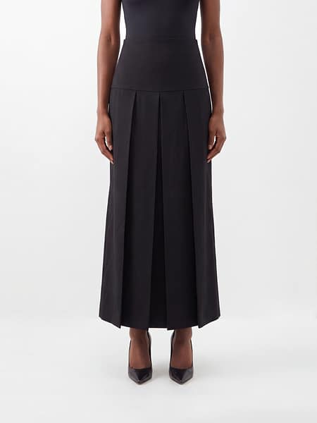 Gonna lunga plissettata Alaïa in maglia di viscosa e seta a vita alta