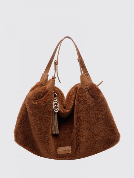 Sac à bandoulière La Carrie en shearling avec double anse réglable et pampilles