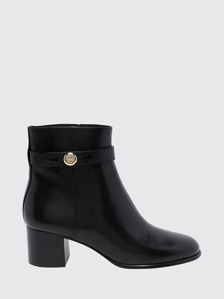 Boots woman Tory Burch