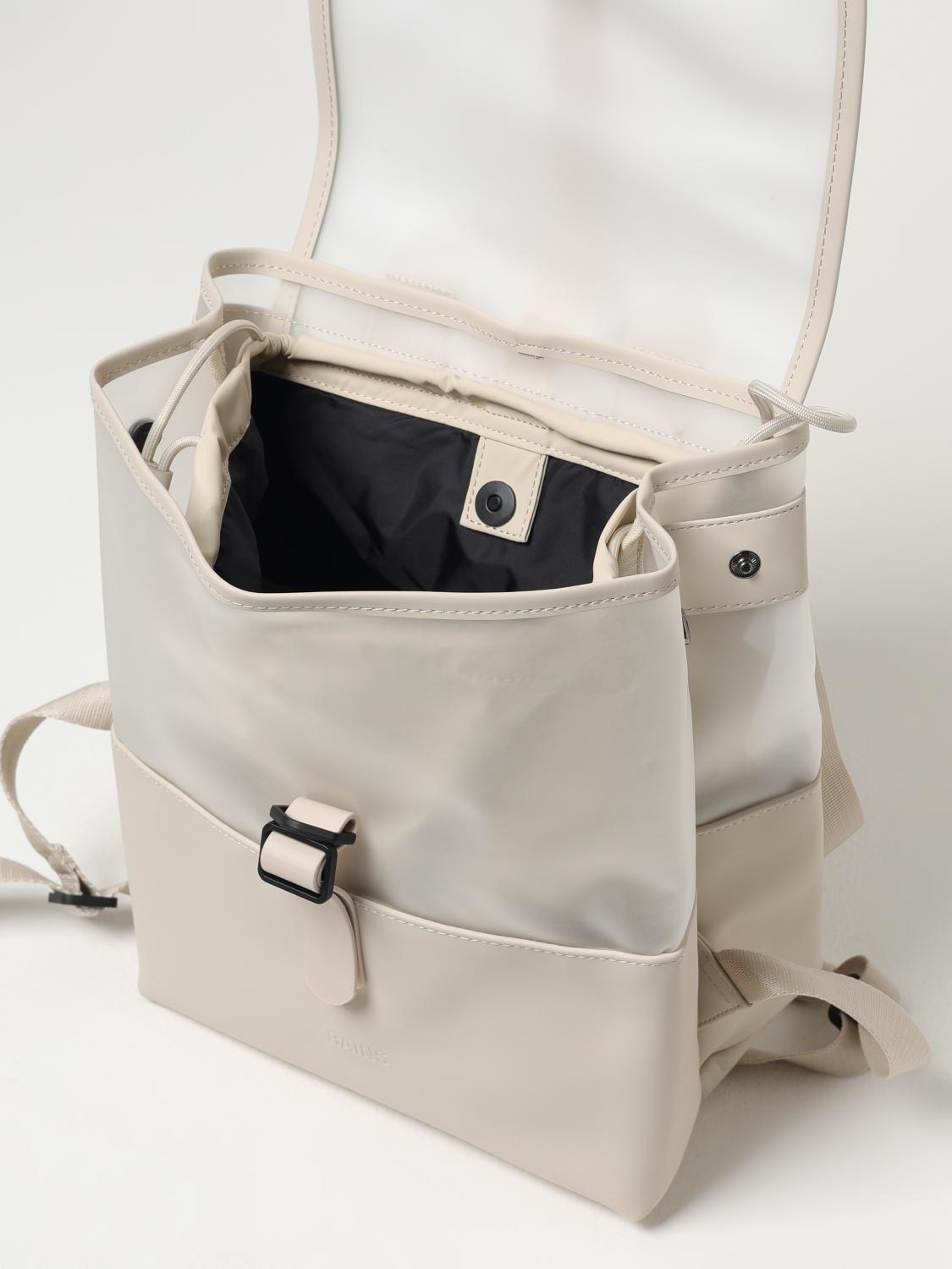 rains white backpack Mini Silhouette is characterized by its squared shape and flap with magnet snap fastenings Rains Waterproof Field Bag Backpack