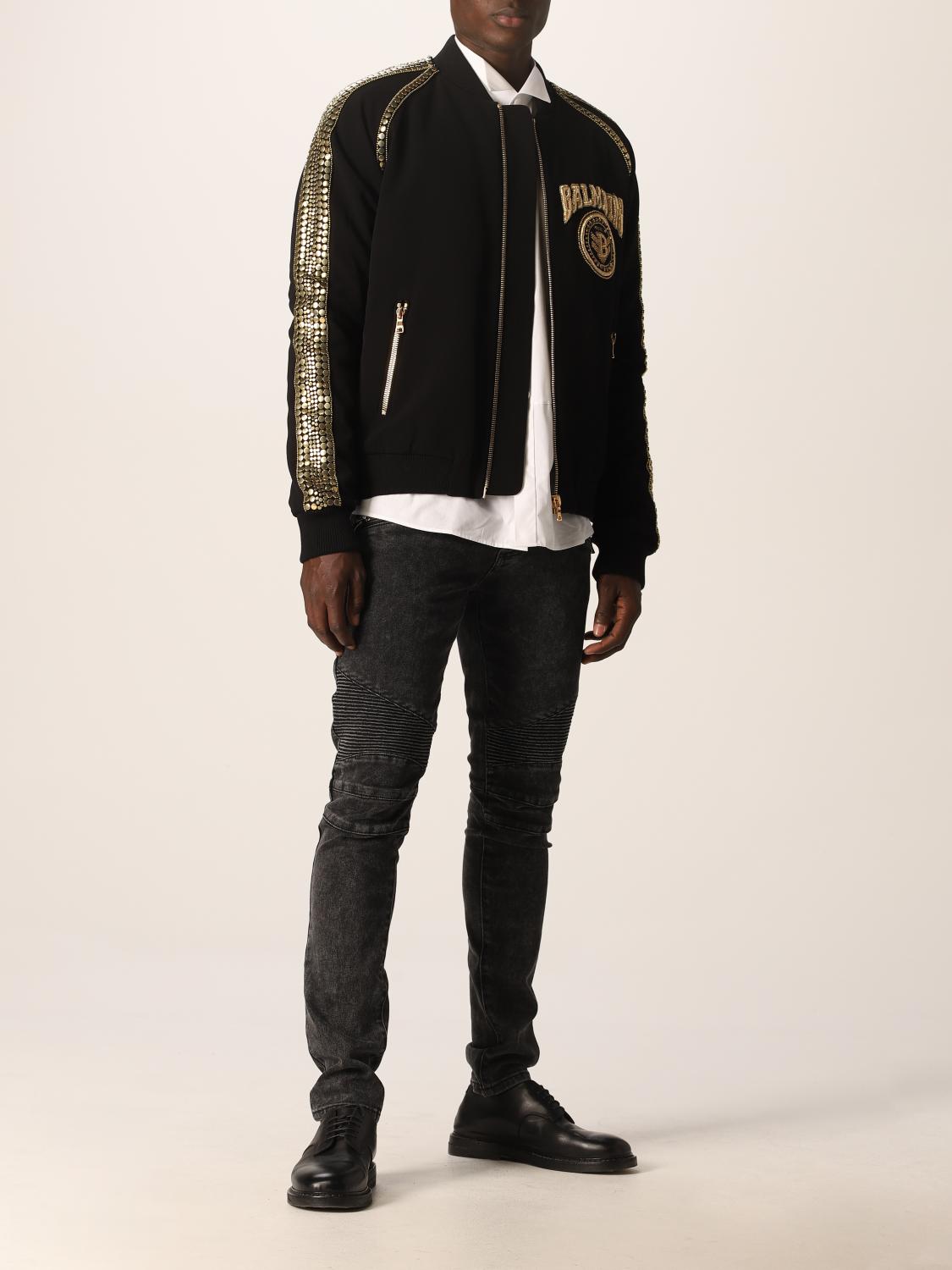 BALMAIN: jacket with studs and embossed logo - Black