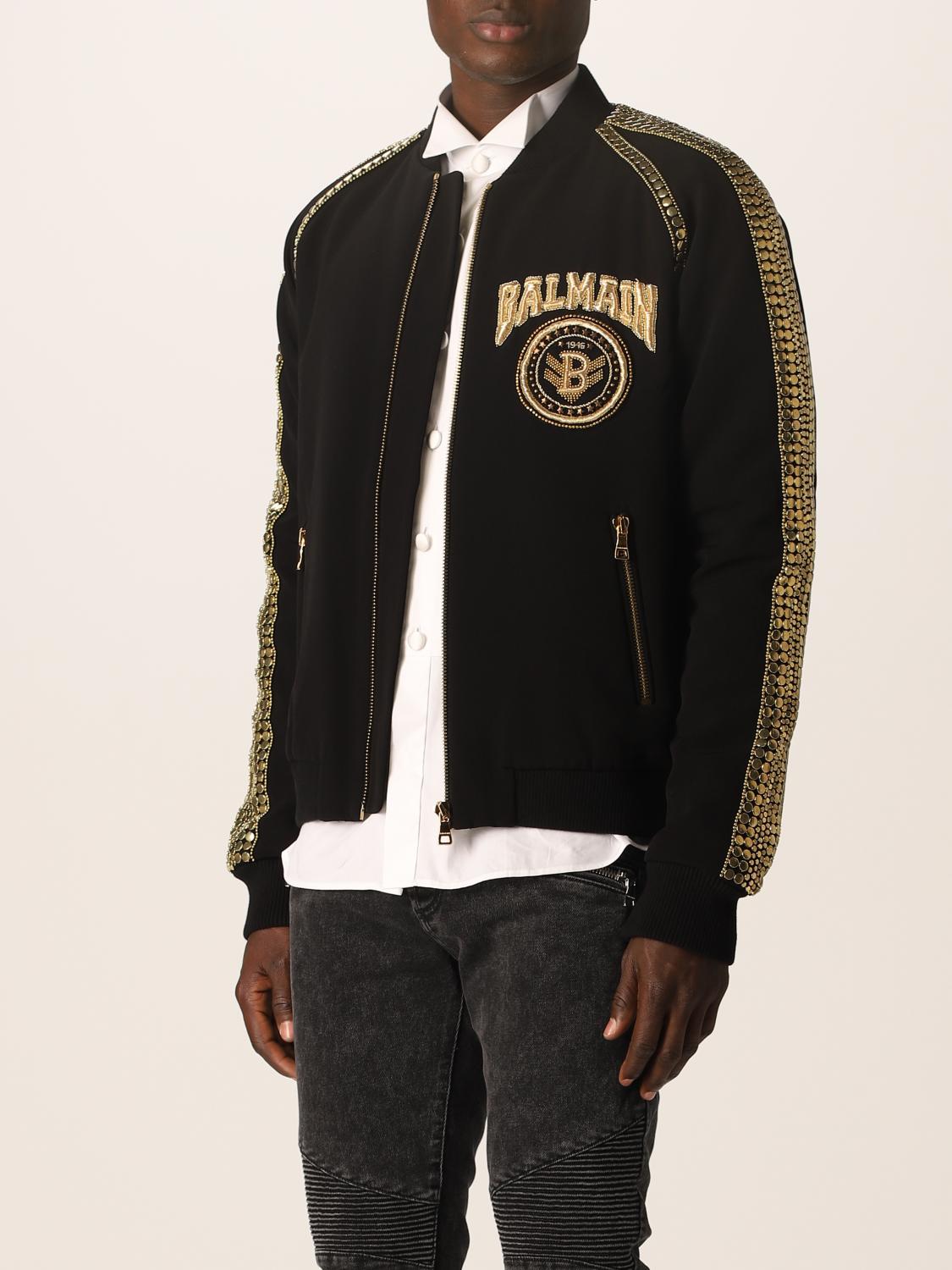 BALMAIN: jacket with studs and embossed logo - Black