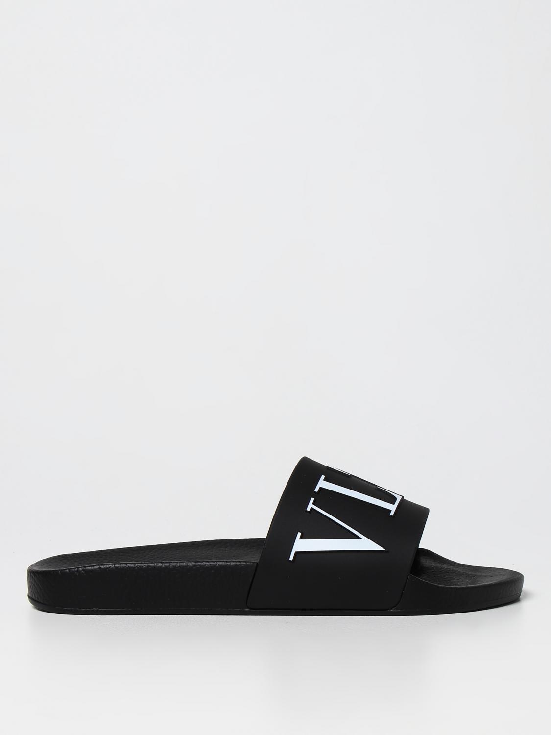 VALENTINO GARAVANI: Rubber sandals with VLTN logo - Black