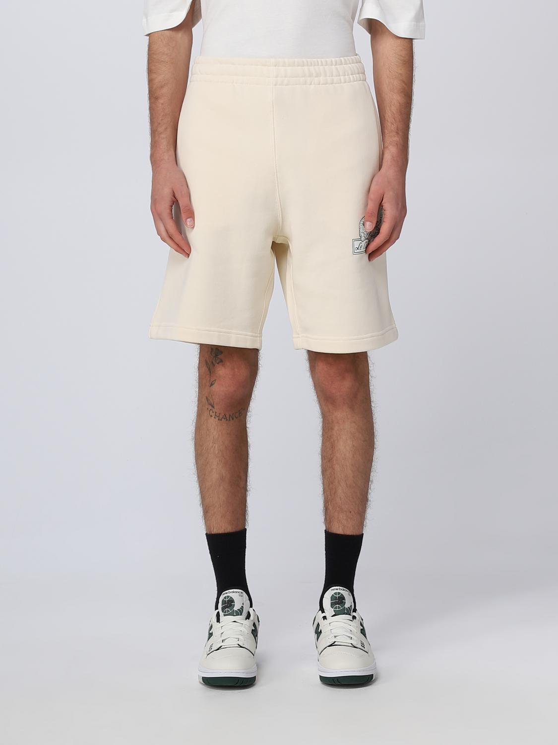 LACOSTE SHORTS: Short men Lacoste, Yellow Cream - Img 1