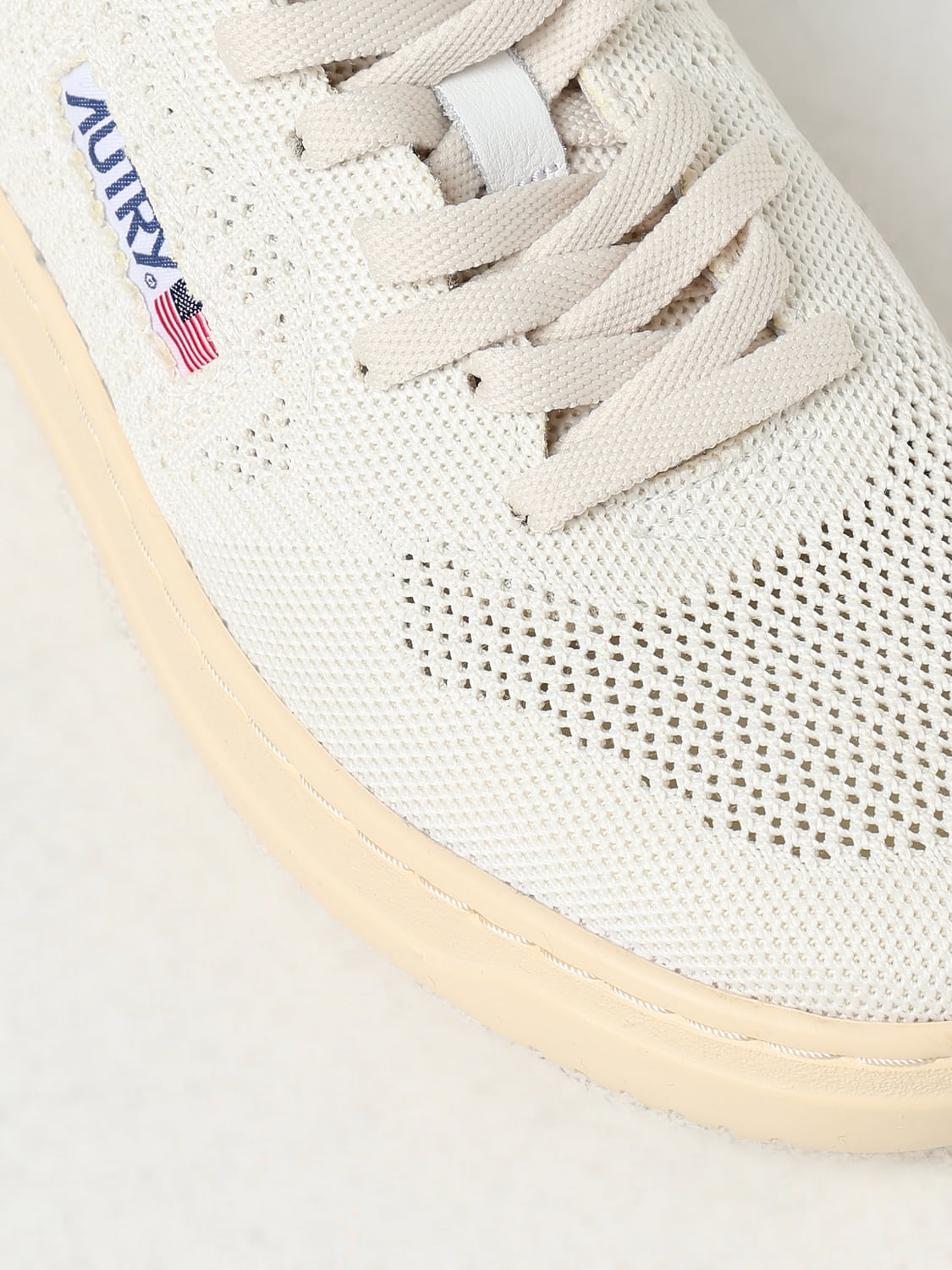AUTRY: Sneakers men - Beige | Autry sneakers EKLMKN08 online at GIGLIO.COM