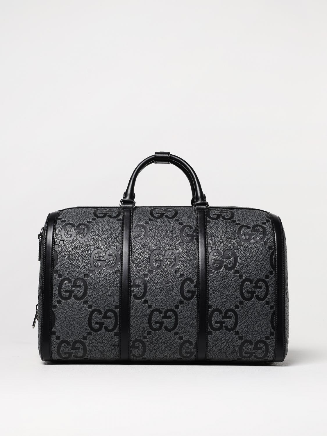 GUCCI VALIGIA: Borsa da viaggio Jumbo GG Gucci in pelle a grana con monogram goffrato , Nero - Img 1