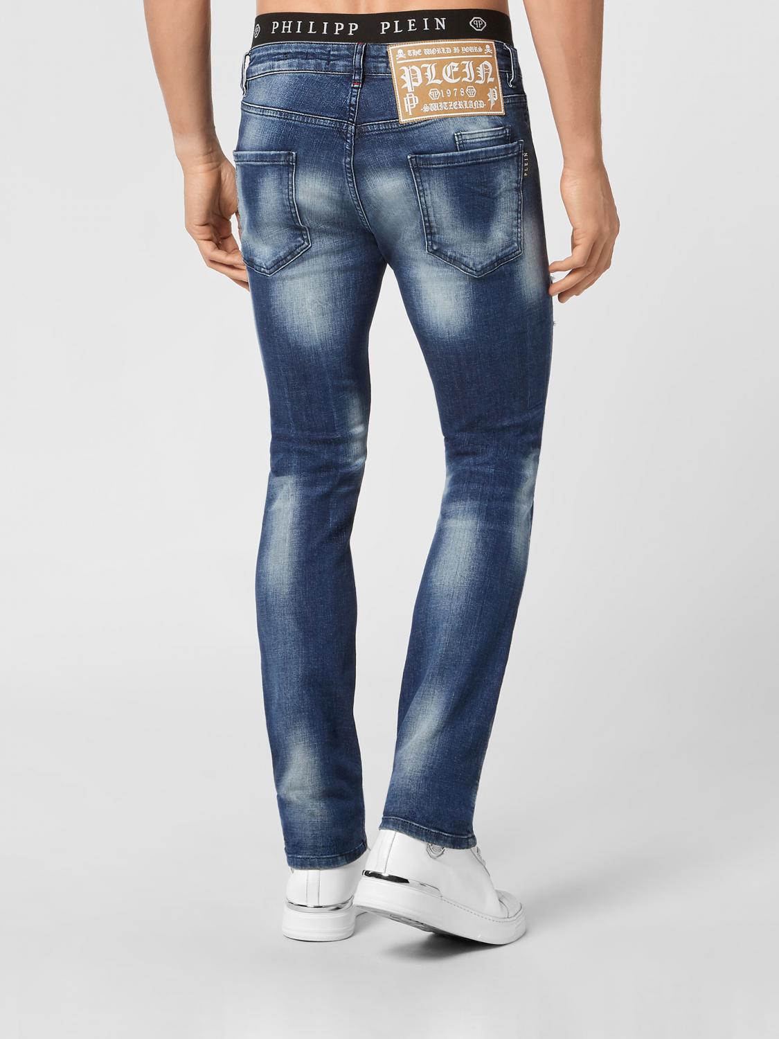 PHILIPP PLEIN JEANS: Jeans skinny Philipp Plein in denim distressed con stampa logo all-over, Arancione - Img 2