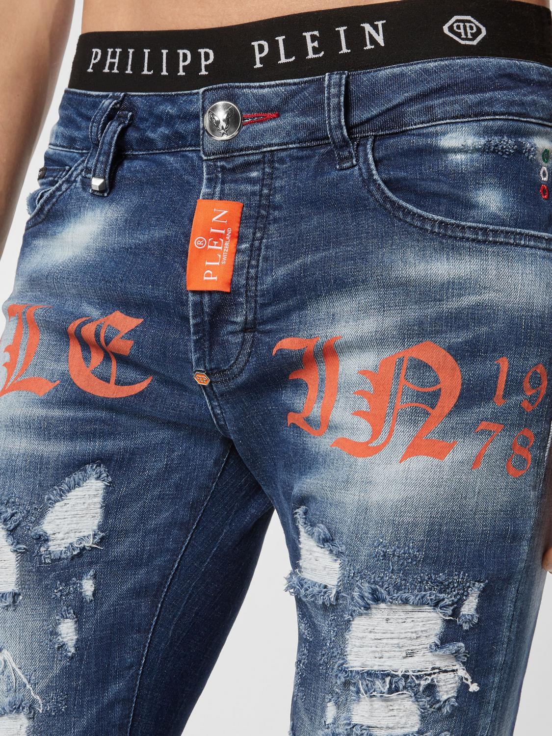 PHILIPP PLEIN JEANS: Jeans skinny Philipp Plein in denim distressed con stampa logo all-over, Arancione - Img 3