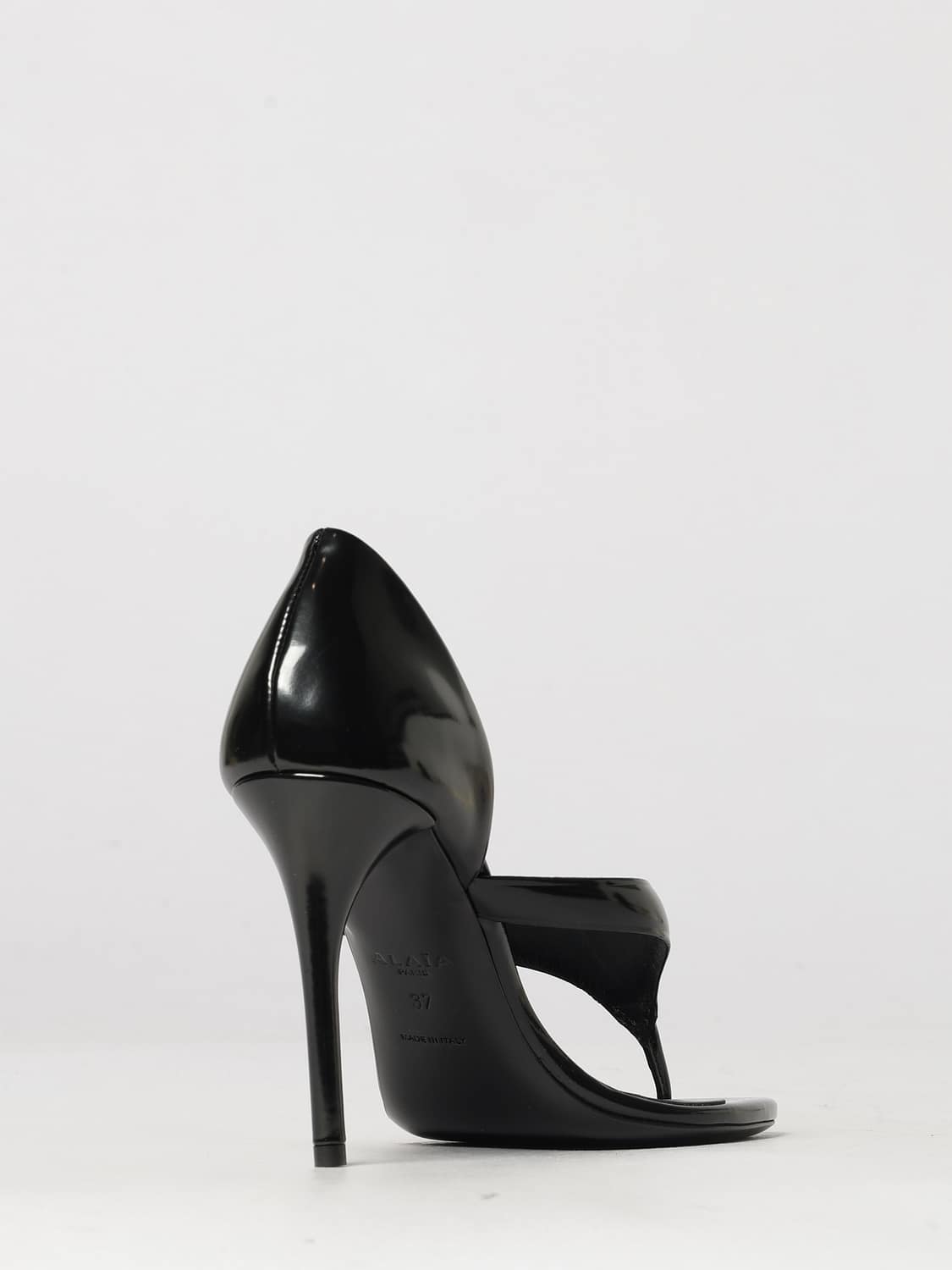 ALAÏA ヒールサンダル: ALAÏA カーフスキンレザー トングミュールサンダル ハイヒールスティレット, ブラック - Img 3