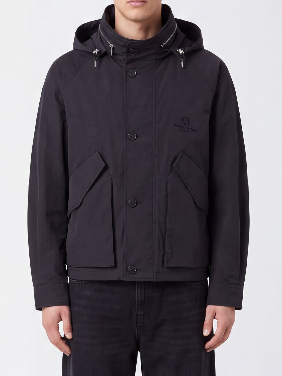 WOOYOUNGMI JACKET: Hooded Windbreaker Jacket Wooyoungmi with a High Neck and Button Closure, Black - Img 1