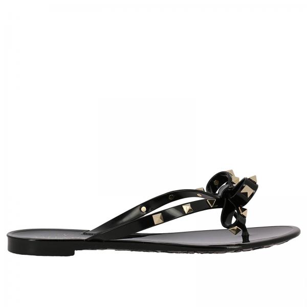 VALENTINO GARAVANI: Valentino Rockstud flip flop sandals in PVC with ...