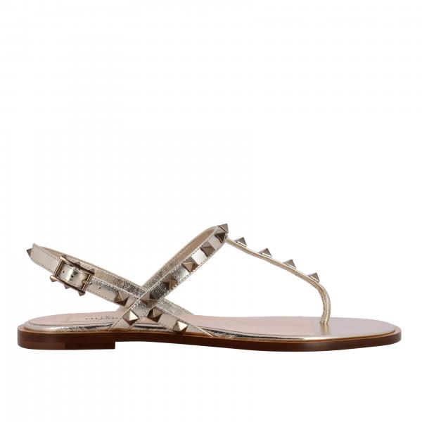 Valentino Garavani Rockstud thong sandal in studded laminated leather