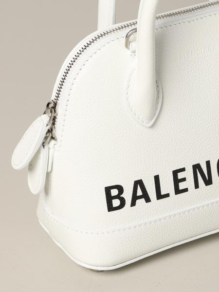 black balenciaga bag with white writing