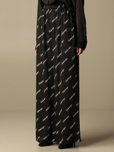 BALENCIAGA: silk trousers with all over logo - Black | Balenciaga 