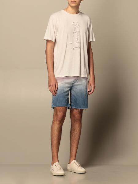 SAINT LAURENT: denim shorts in shaded denim - Giglio.com