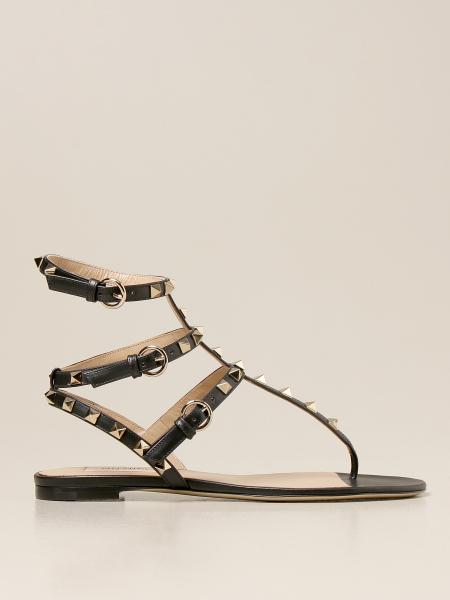 VALENTINO GARAVANI: Rockstud flat sandal in leather - Black | Valentino ...