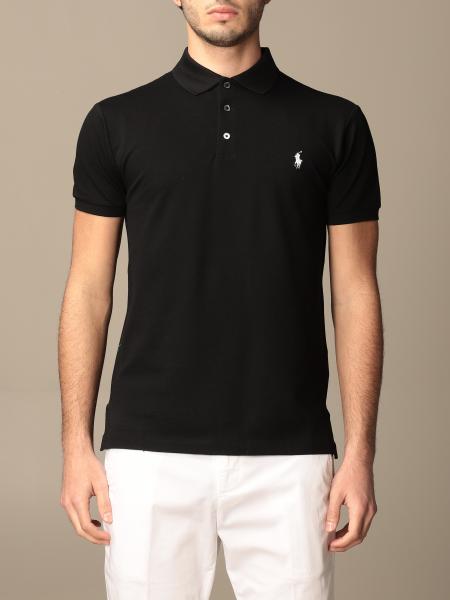 black polo with grey pants