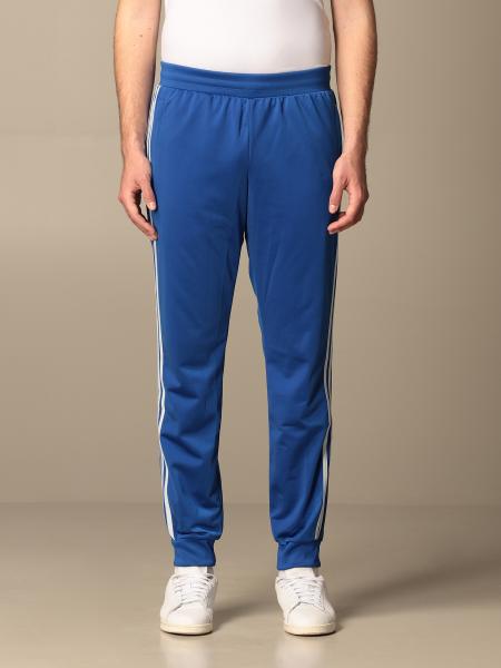 ADIDAS ORIGINALS: jogging trousers with logo Blue | Adidas Originals pants GN3853 online on GIGLIO.COM
