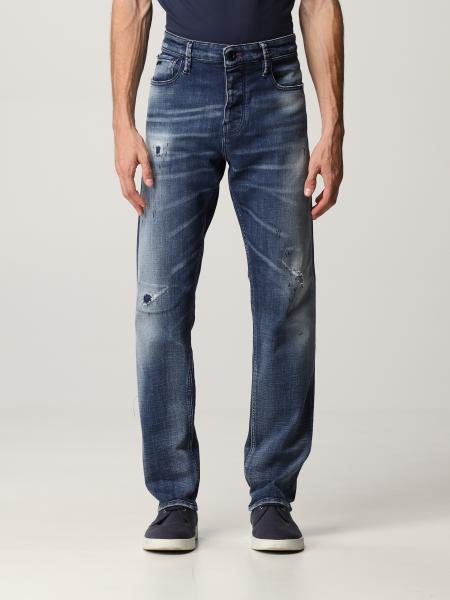 Emporio Armani jeans in washed ripped denim and logo