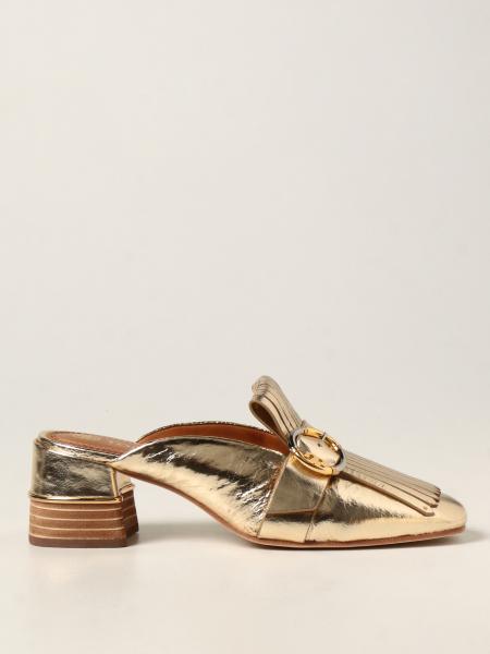 Kiltie Tory Burch mules in laminated leather