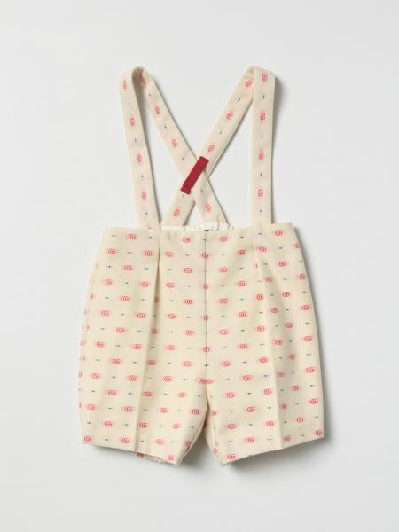Gucci dungarees with all-over Gucci logo print