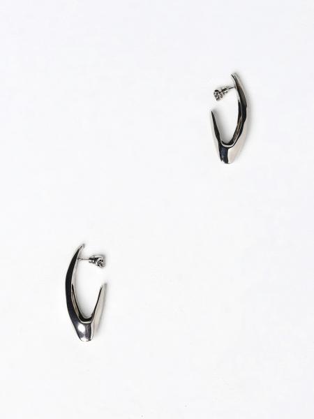Faceted Alexander McQueen earrings in brass