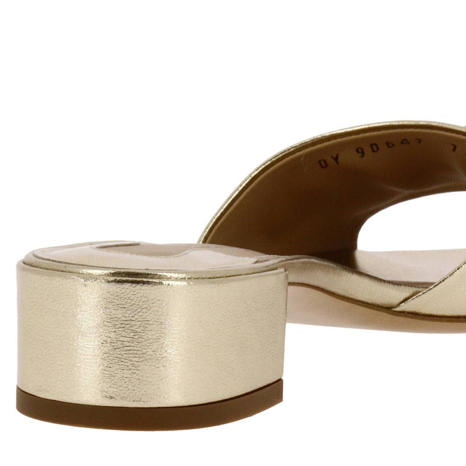 black and gold ferragamo slides