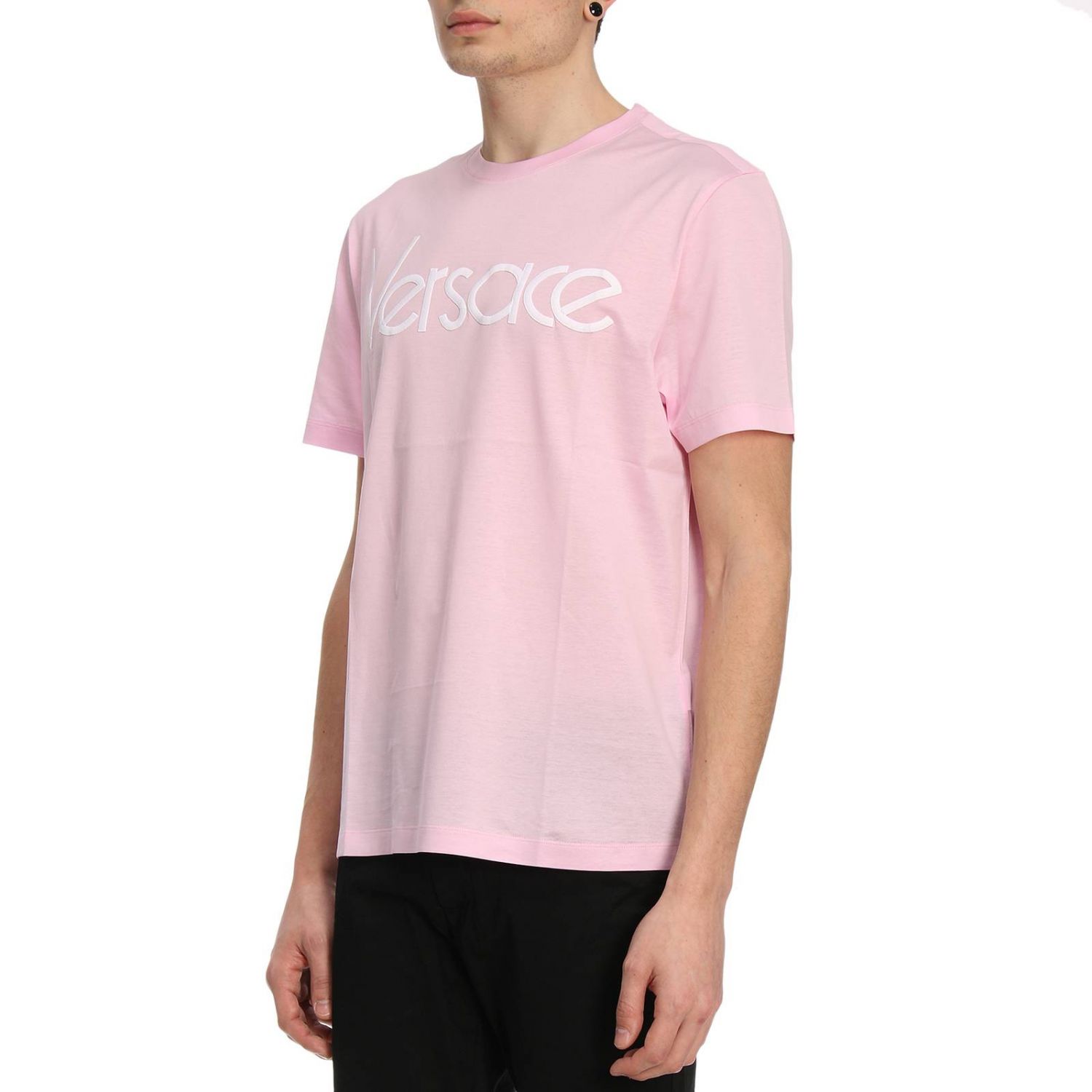 men in pink t shirt