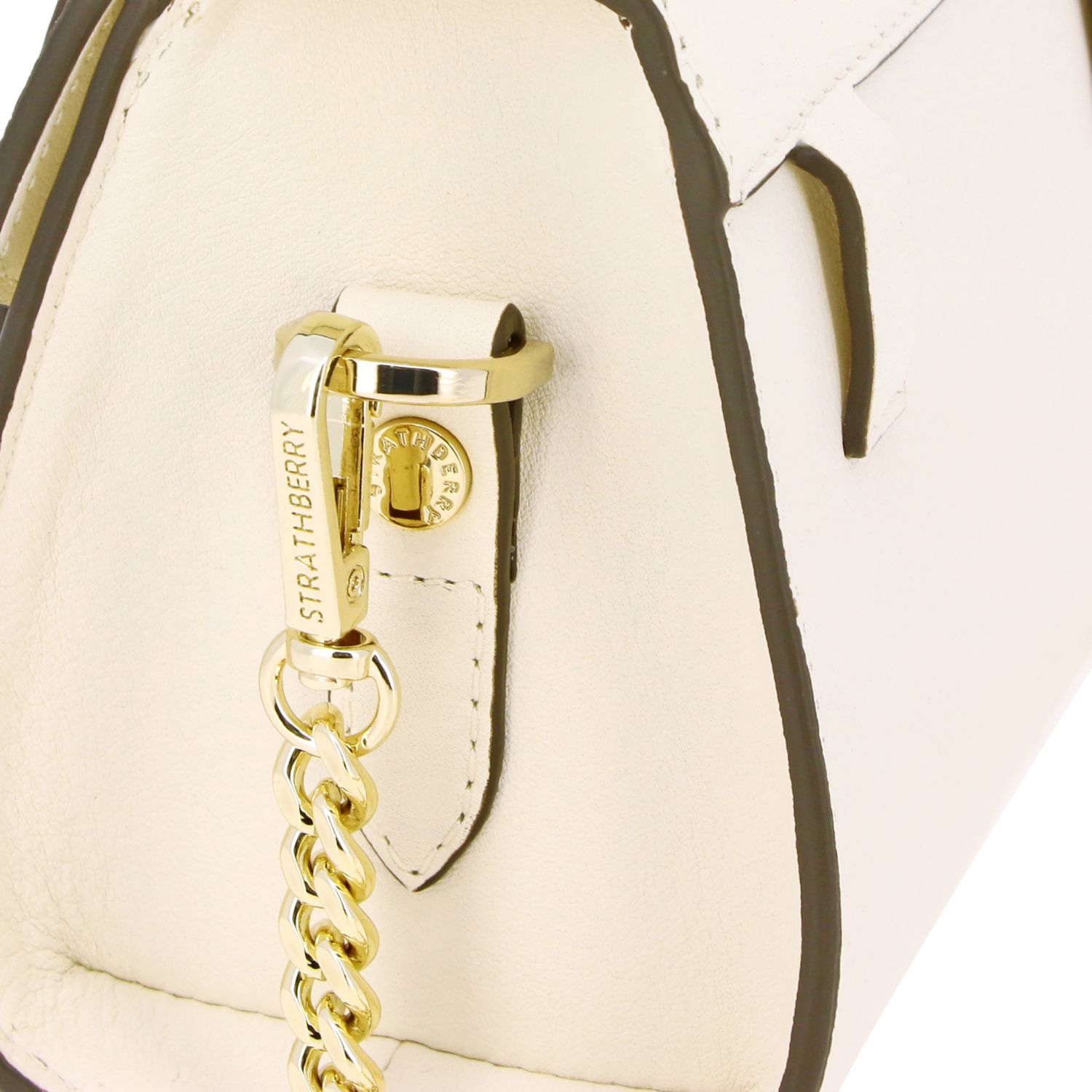 cream over shoulder bag