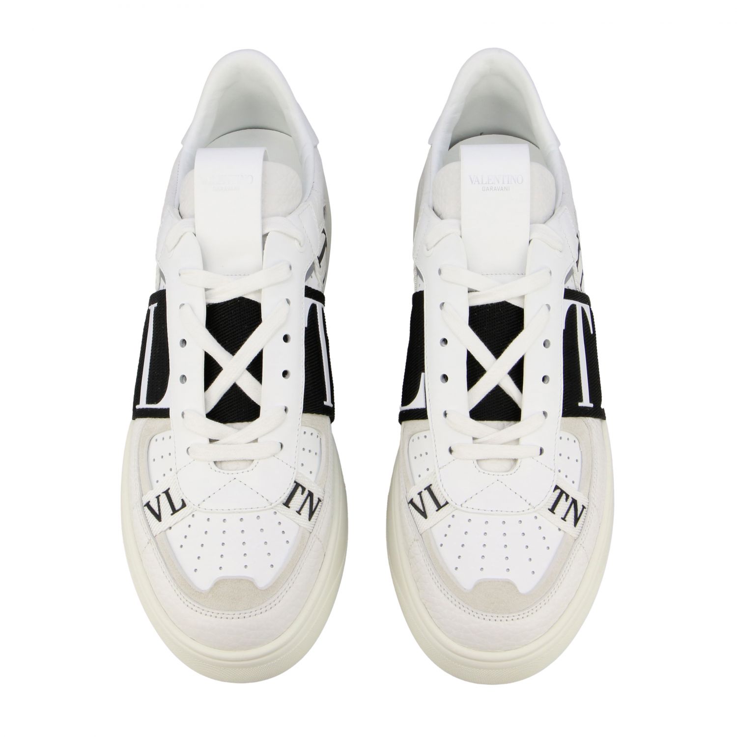 VALENTINO GARAVANI: Zapatillas de cuero con banda VLTN y monograma - Blanco  | Zapatillas Valentino Garavani TY2S0C58 WRQ GIGLIO.COM