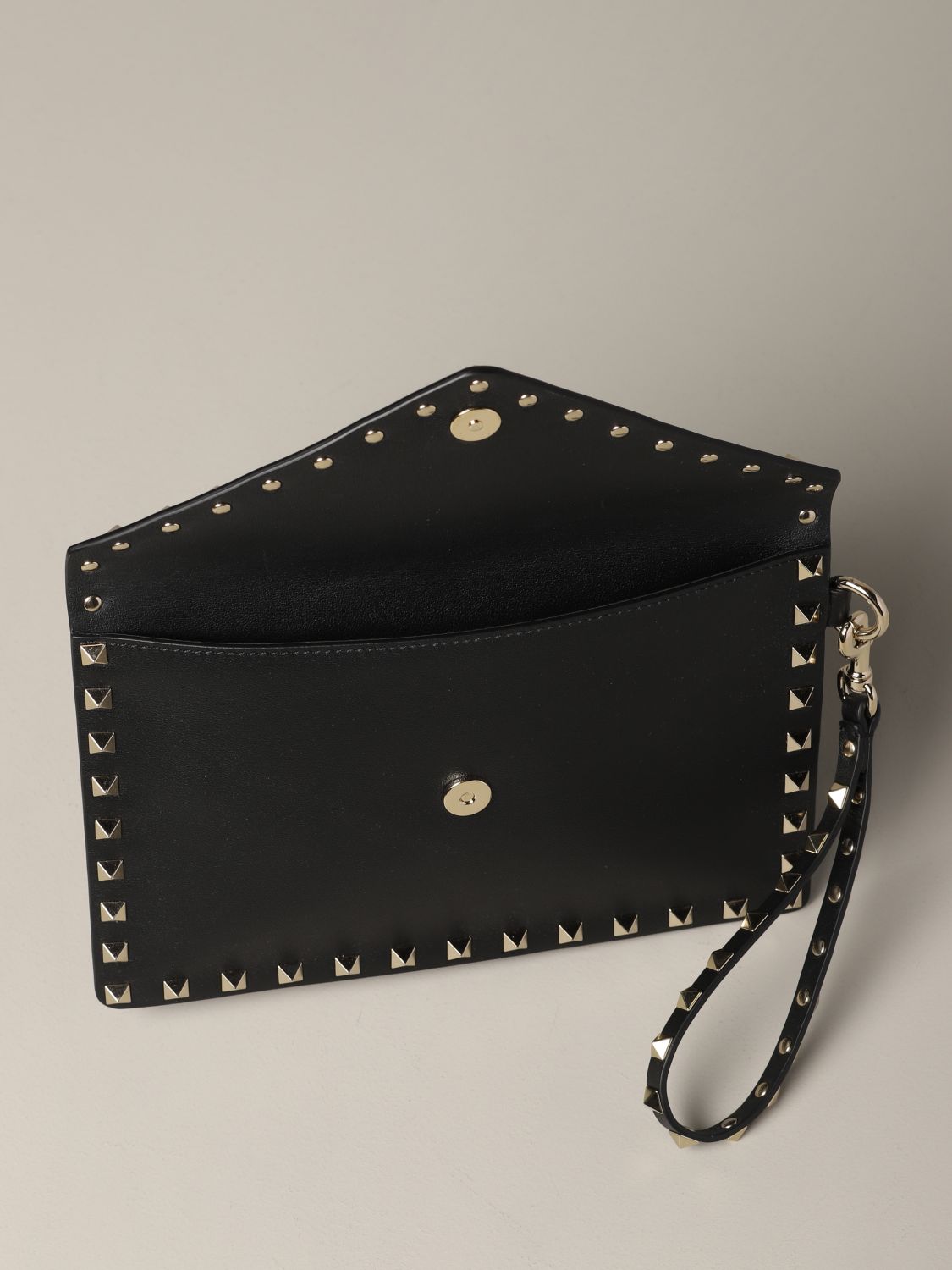 Valentino Garavani Outlet: leather clutch bag with studs | Clutch ...