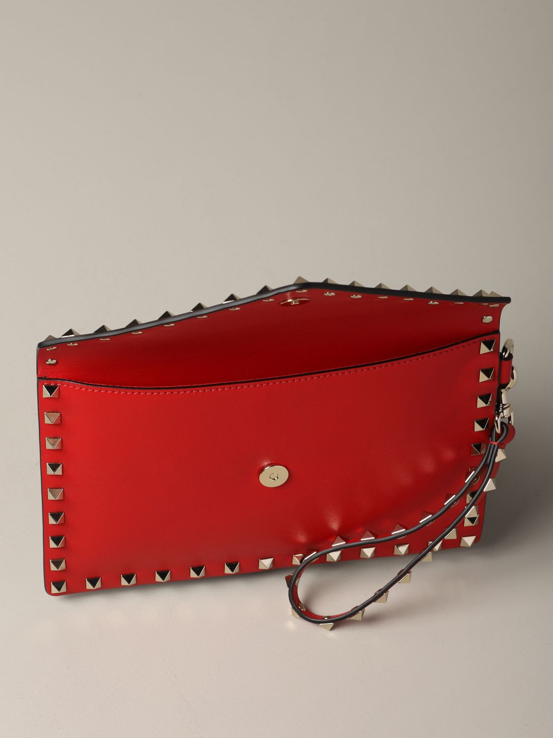 Valentino Garavani leather clutch bag with studs | Clutch Valentino ...