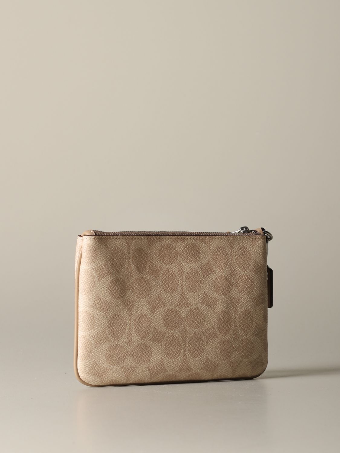 COACH: envelope clutch in leather and coated canvas with logo - Beige