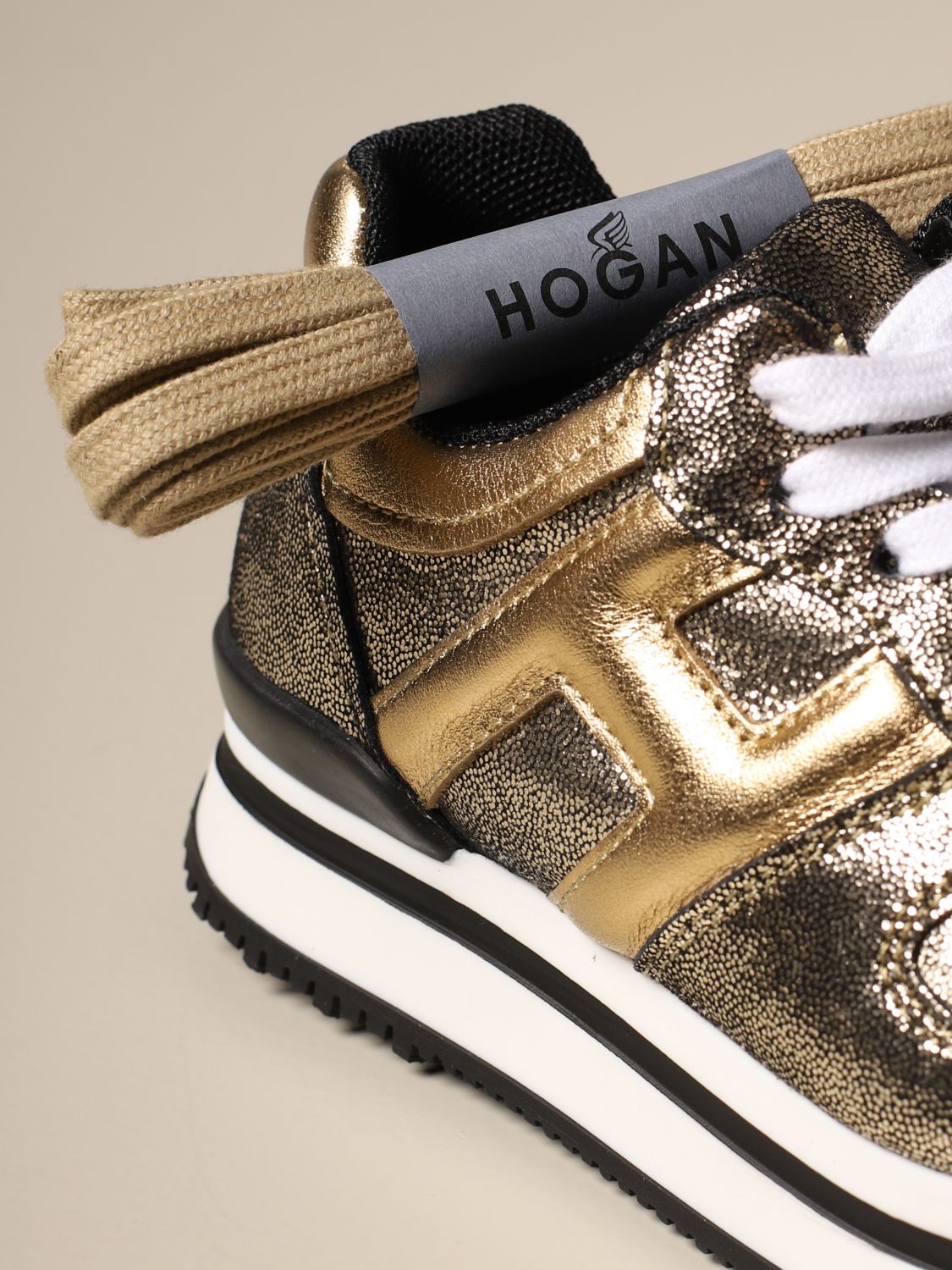 hogan gold sneakers
