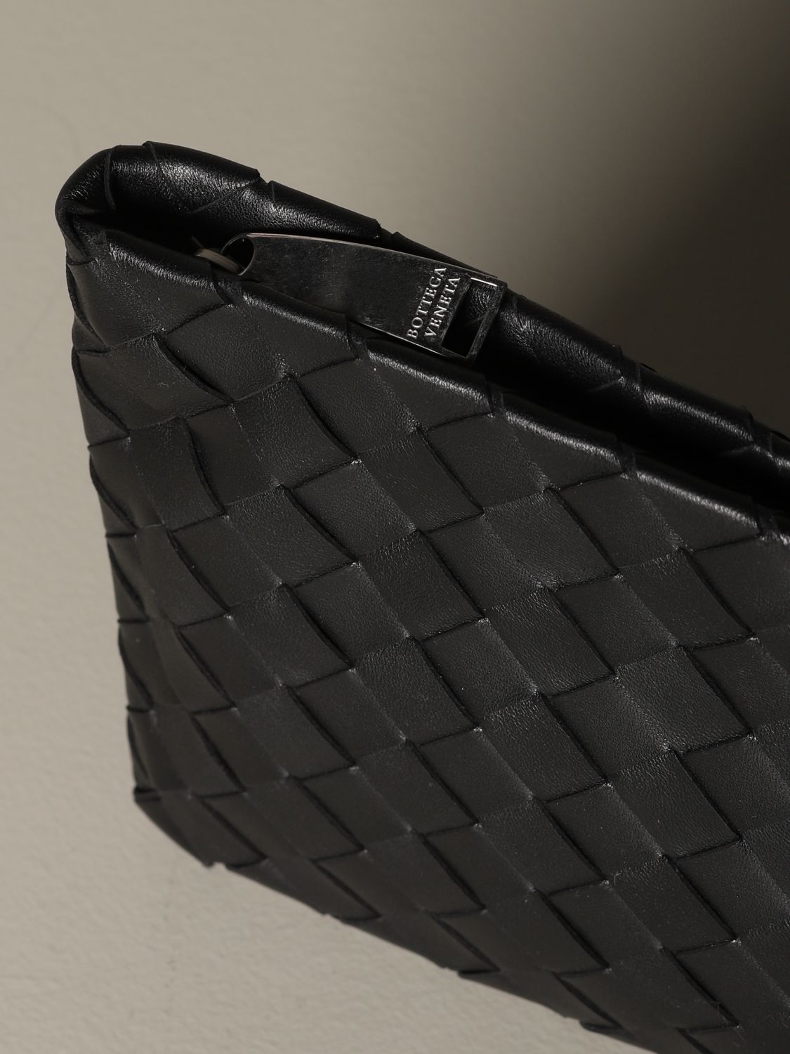 leather woven clutch