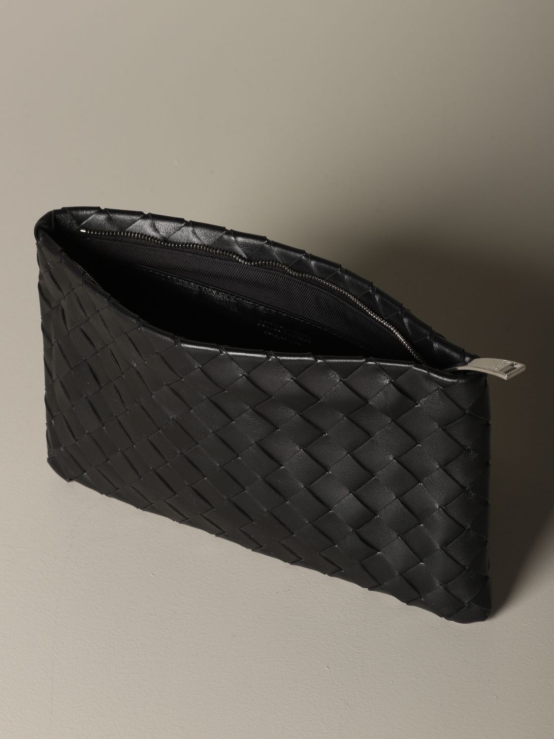 leather woven clutch