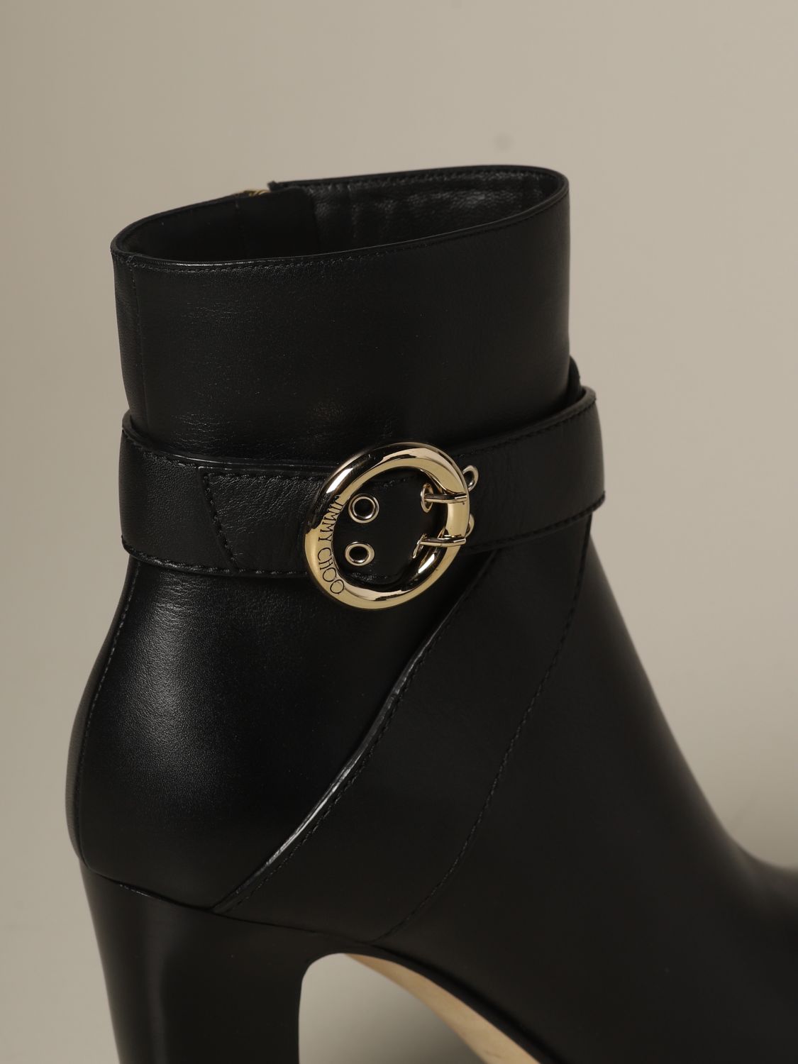 black heeled boots with buckles