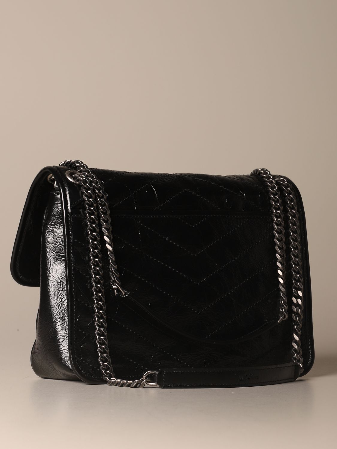 SAINT LAURENT: Monogram Niki bag in shiny and quilted leather - Black ...