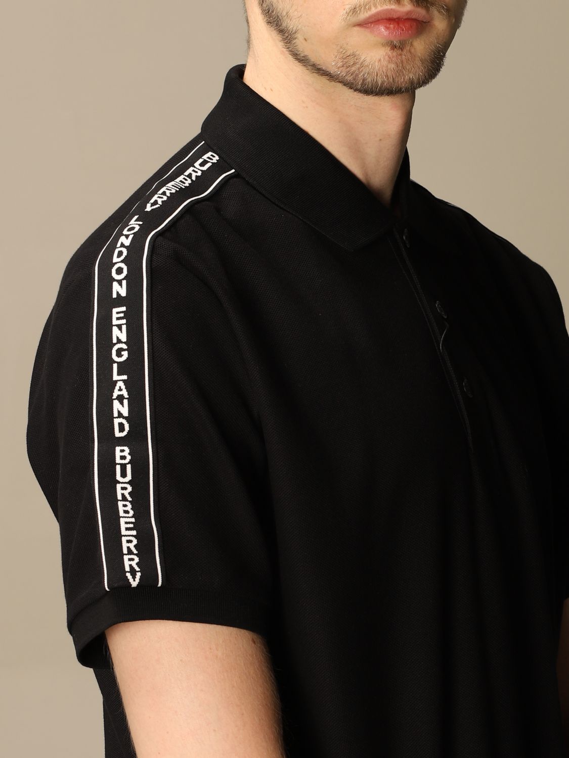 Burberry Outlet: Stonely polo shirt in piqué cotton with logoed bands - Black | Burberry polo