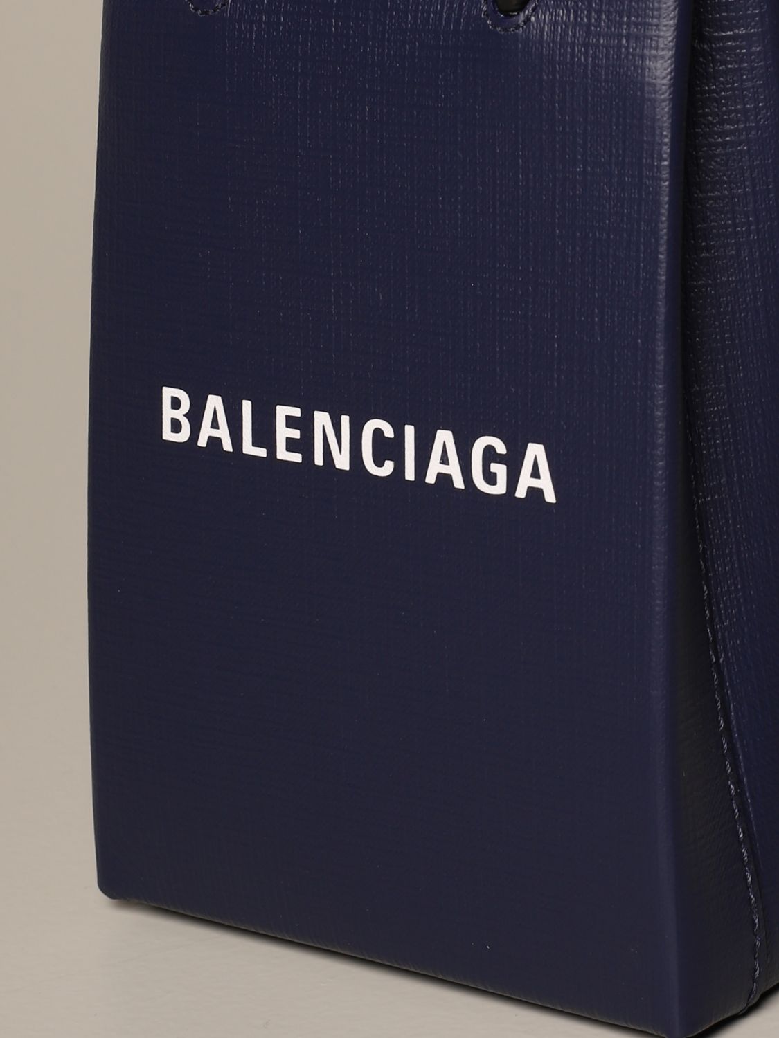 BALENCIAGA: mobile phone bag in textured leather with logo - Navy ...