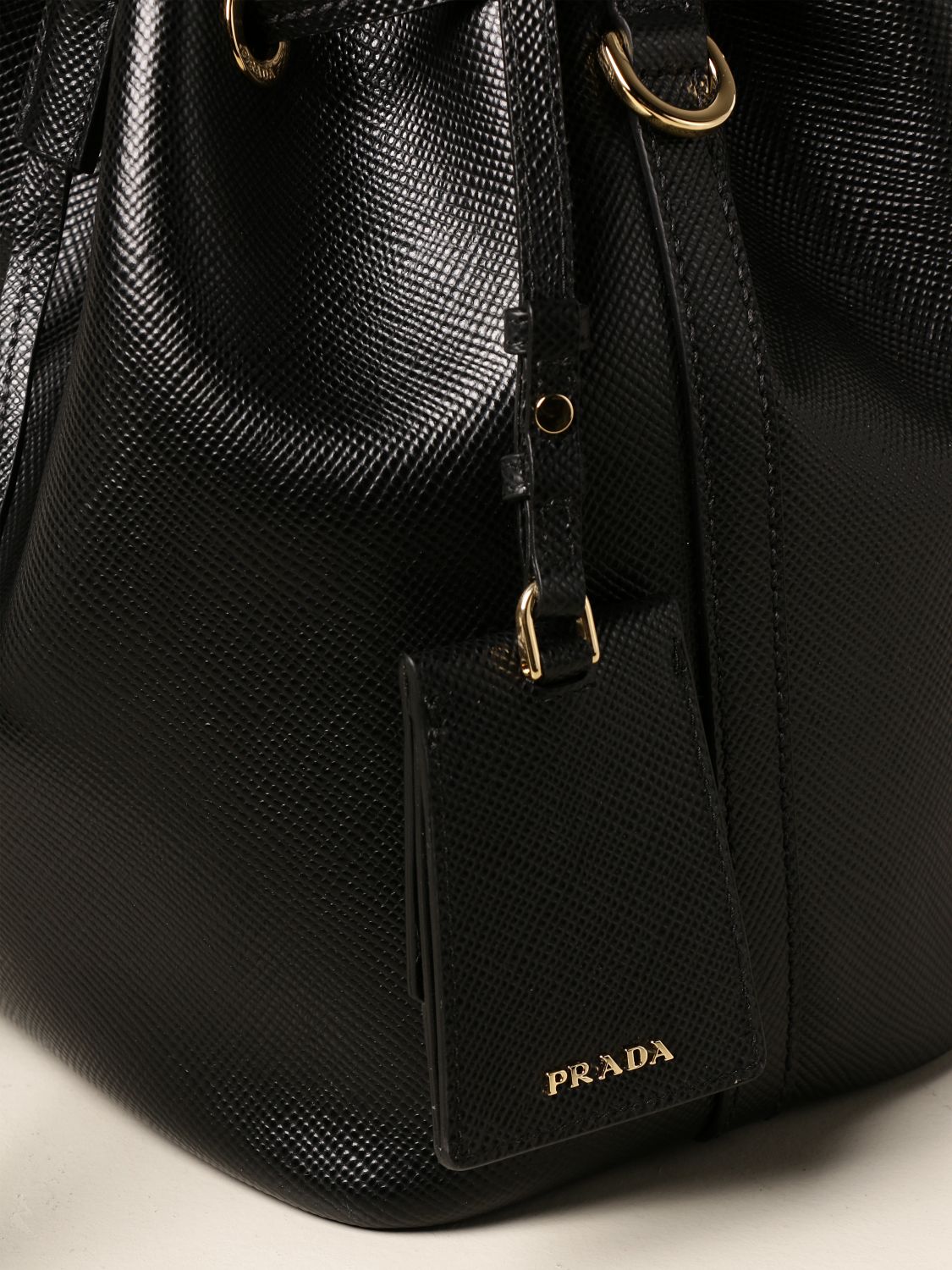 PRADA: bucket bag in saffiano leather - Black | Prada handbag 1BE032
