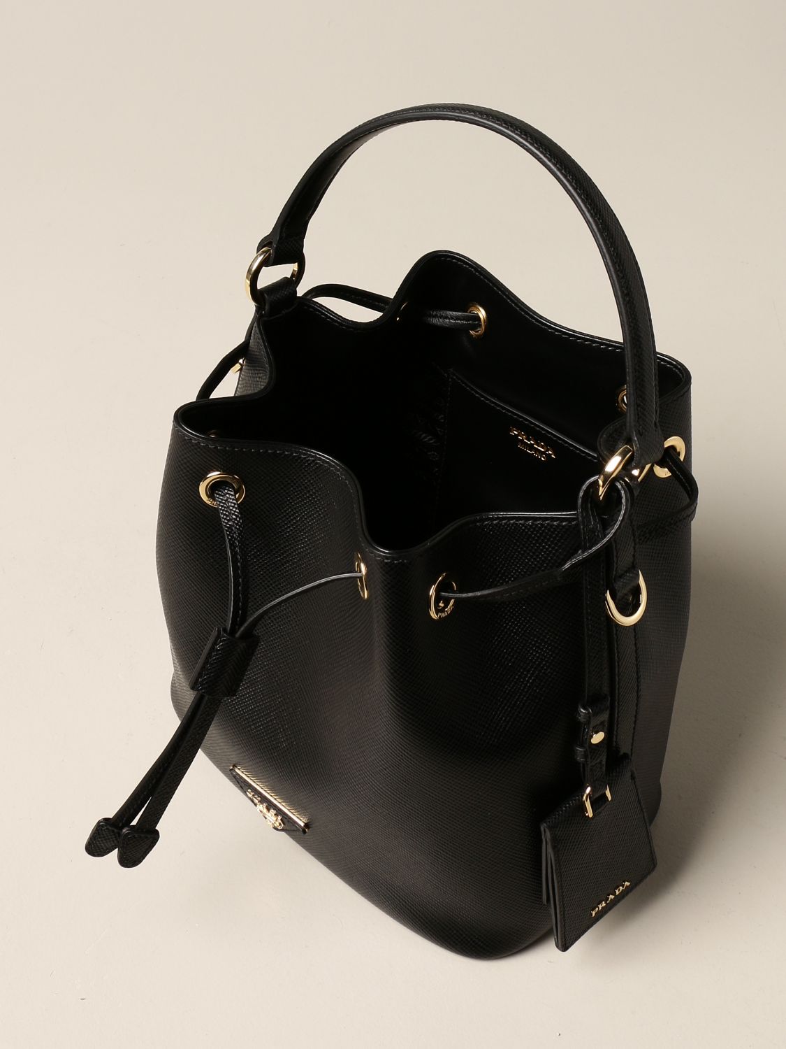 PRADA: bucket bag in saffiano leather - Black | Prada handbag 1BE032 OOO  2A4A online on 