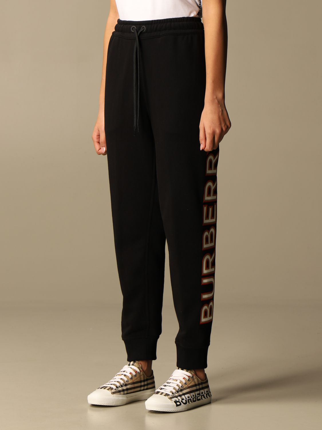 BURBERRY: Esmee cotton jogging trousers with logo - Black | pants 8037260 online at GIGLIO.COM