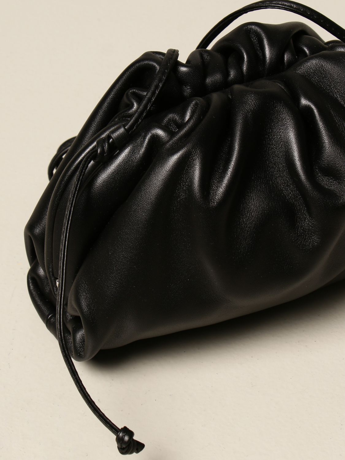 BOTTEGA VENETA: The mini pouch clutch in leather | Mini Bag 