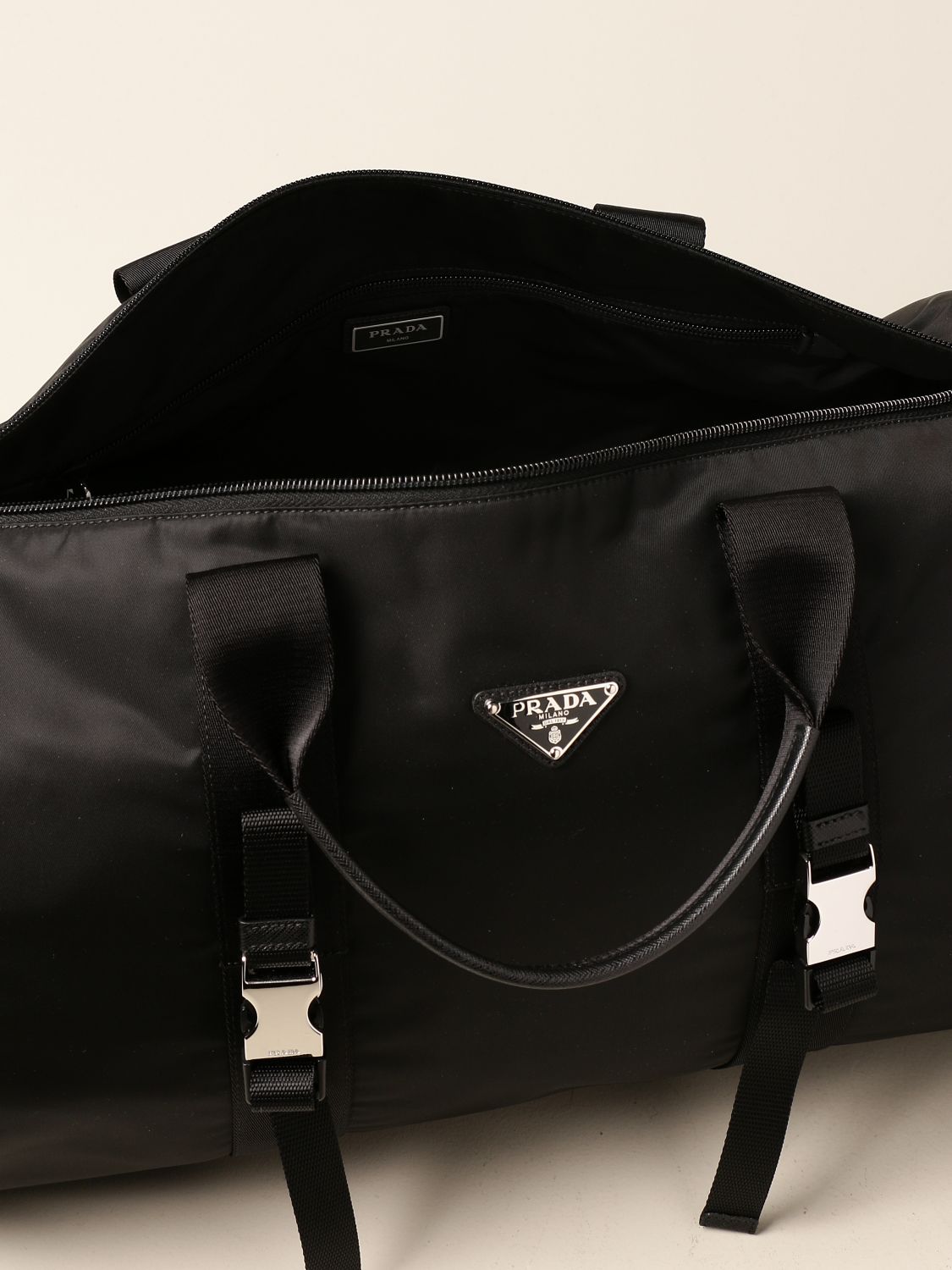 Travel bag Prada Black in Synthetic - 26879685