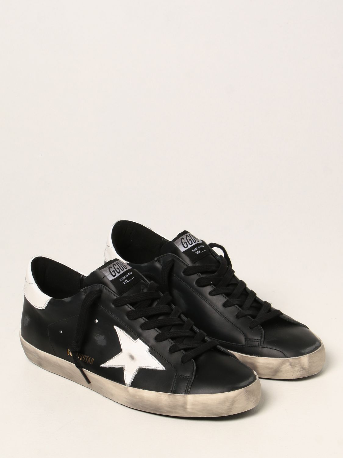 GOLDEN GOOSE: Super-Star classic trainers in leather - Black | Golden ...