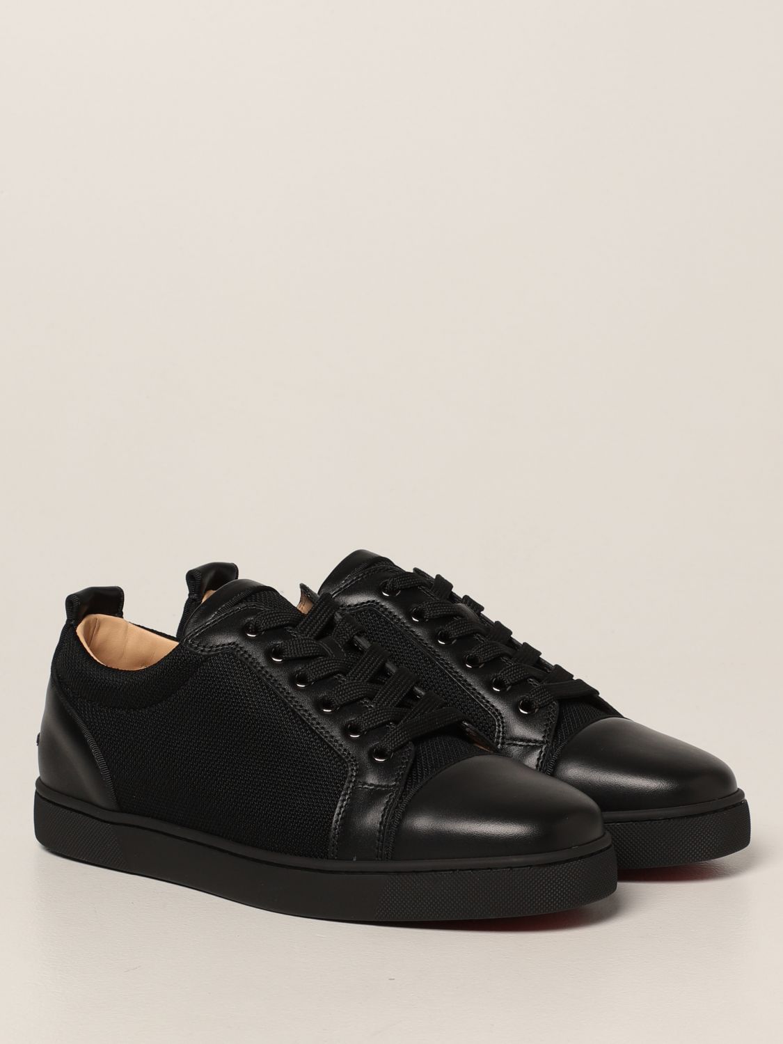 CHRISTIAN LOUBOUTIN: Louis Junior Orlato sneakers in leather and fabric | Sneakers Louboutin Men Black Sneakers Christian Louboutin GIGLIO.COM